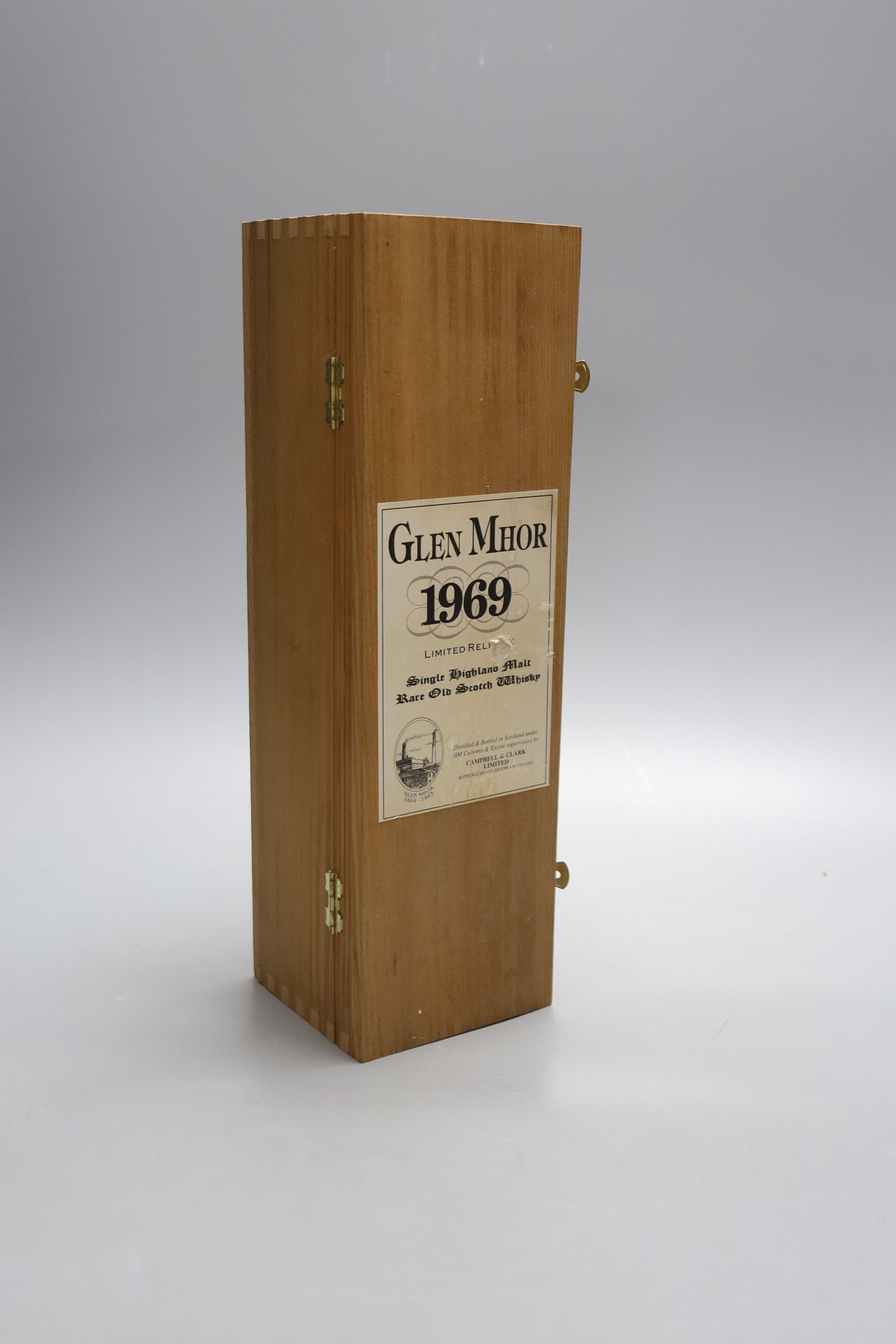 A bottle of Glen Mhor 1969 single Highland malt whisky, no. 518 off 2265, in wooden presentation case